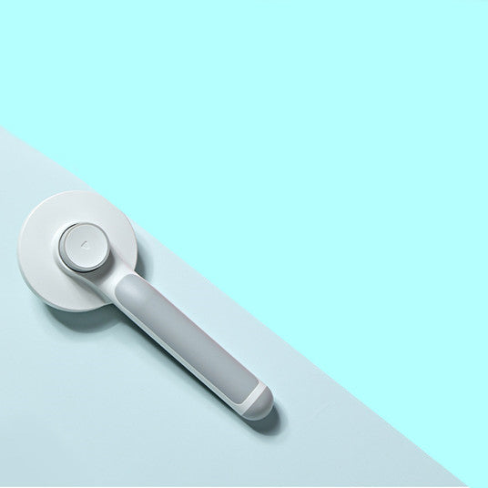 Rotating Pin Detangling Comb